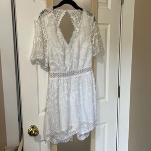 White Romper, only worn once. Great condition and has been cleaned.
